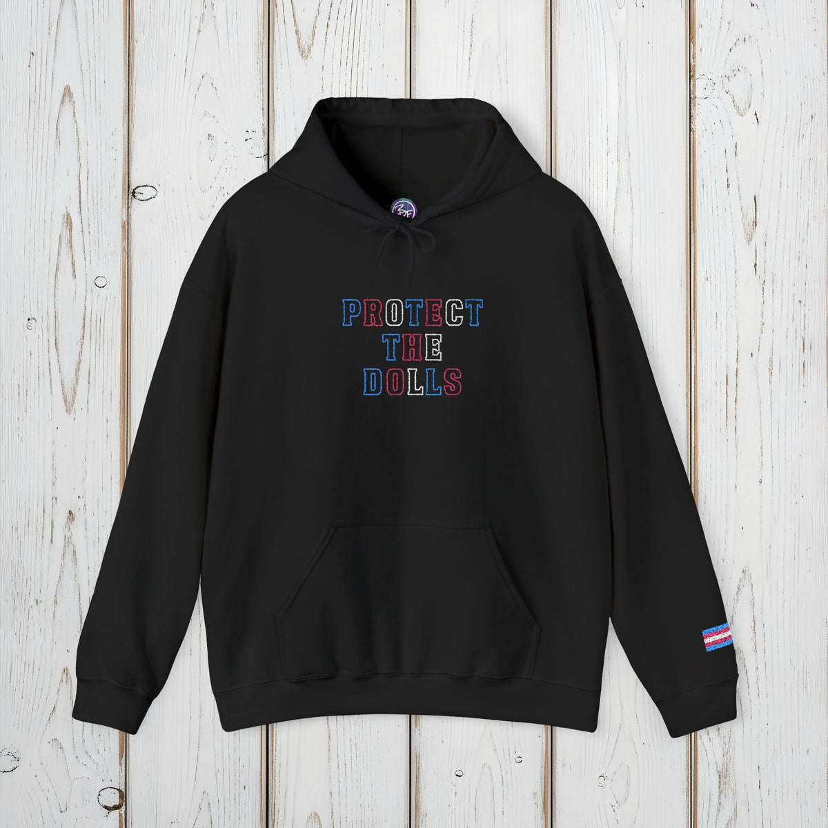 Bespattered Facade Protect the Dolls LGBTQ+ Pride Trans Support Embroidered Unisex Heavy Blend™ Hooded Sweatshirt